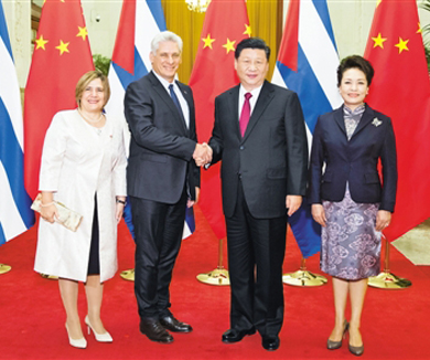 习近平举行仪式欢迎古巴国务委员会主席兼部长会议主席访华并同其举行会谈