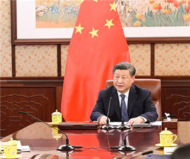 习近平会见李家超