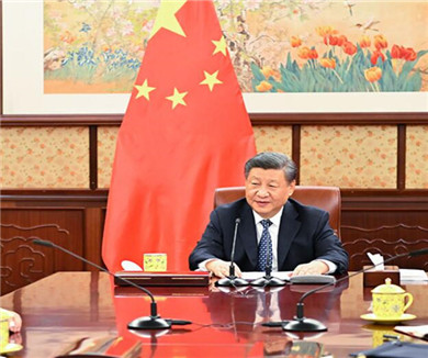 习近平会见贺一诚