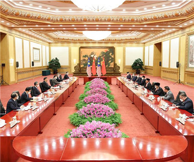 习近平会见马来西亚总理