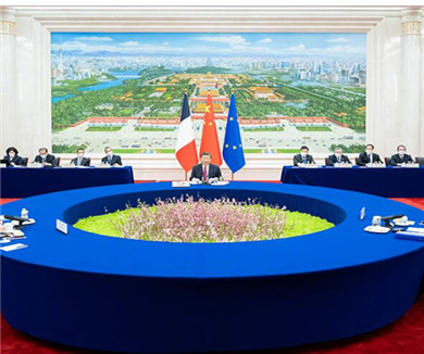 习近平同法国总统欧盟委员会主席举行中法欧三方会晤