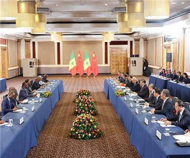 习近平会见塞内加尔总统
